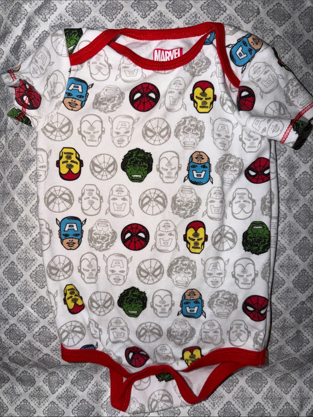 Marvel White Baby Onesie with Red Trim and Multicolor Superhero Faces
